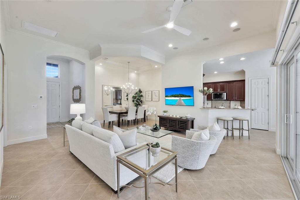 a living room with furniture and view