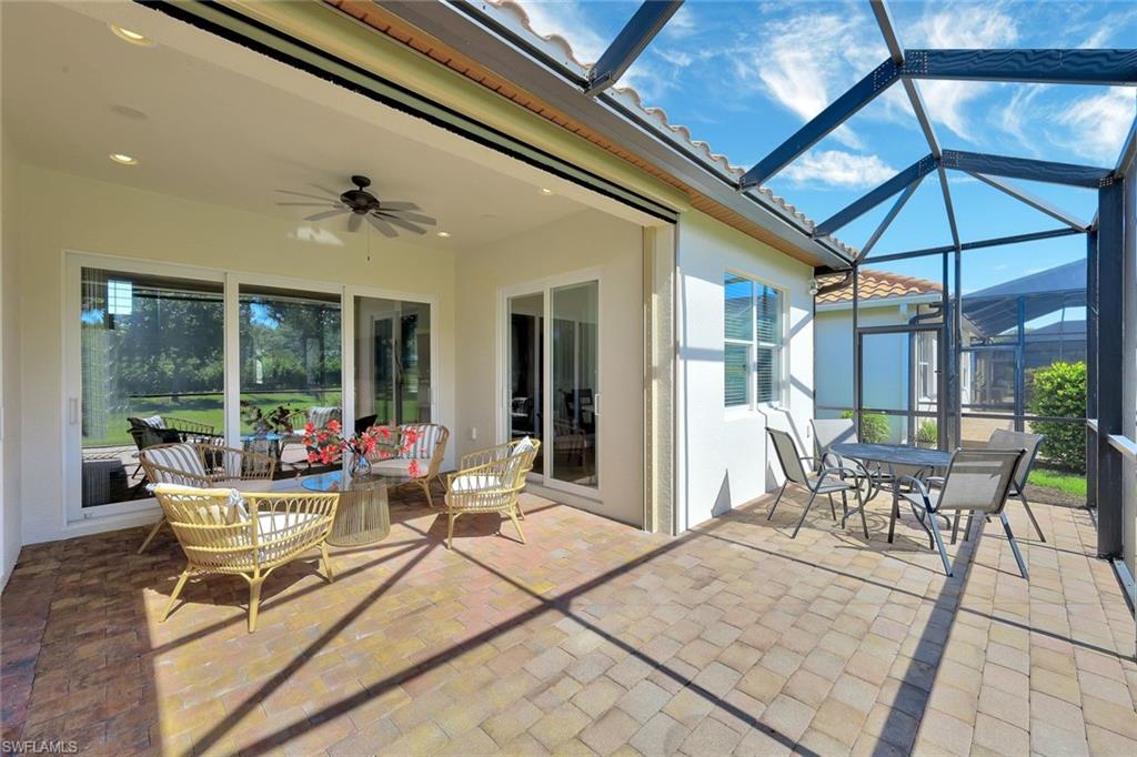9058 Limestone Lane Naples, FL 34120 - Photo 24 of 48 a living room with furniture