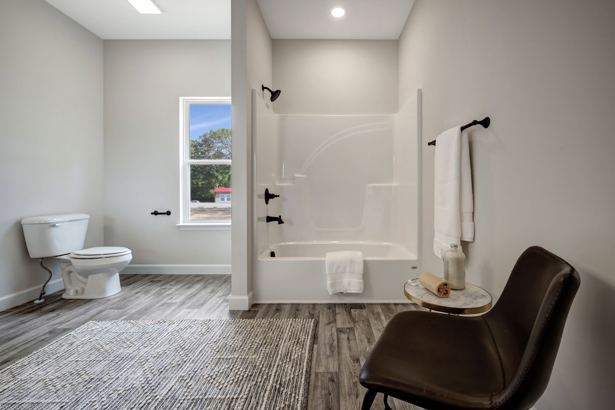1514 East Piney Road Dickson, TN 37055 - Photo 13 of 29 a bathroom with a toilet tub and a shower