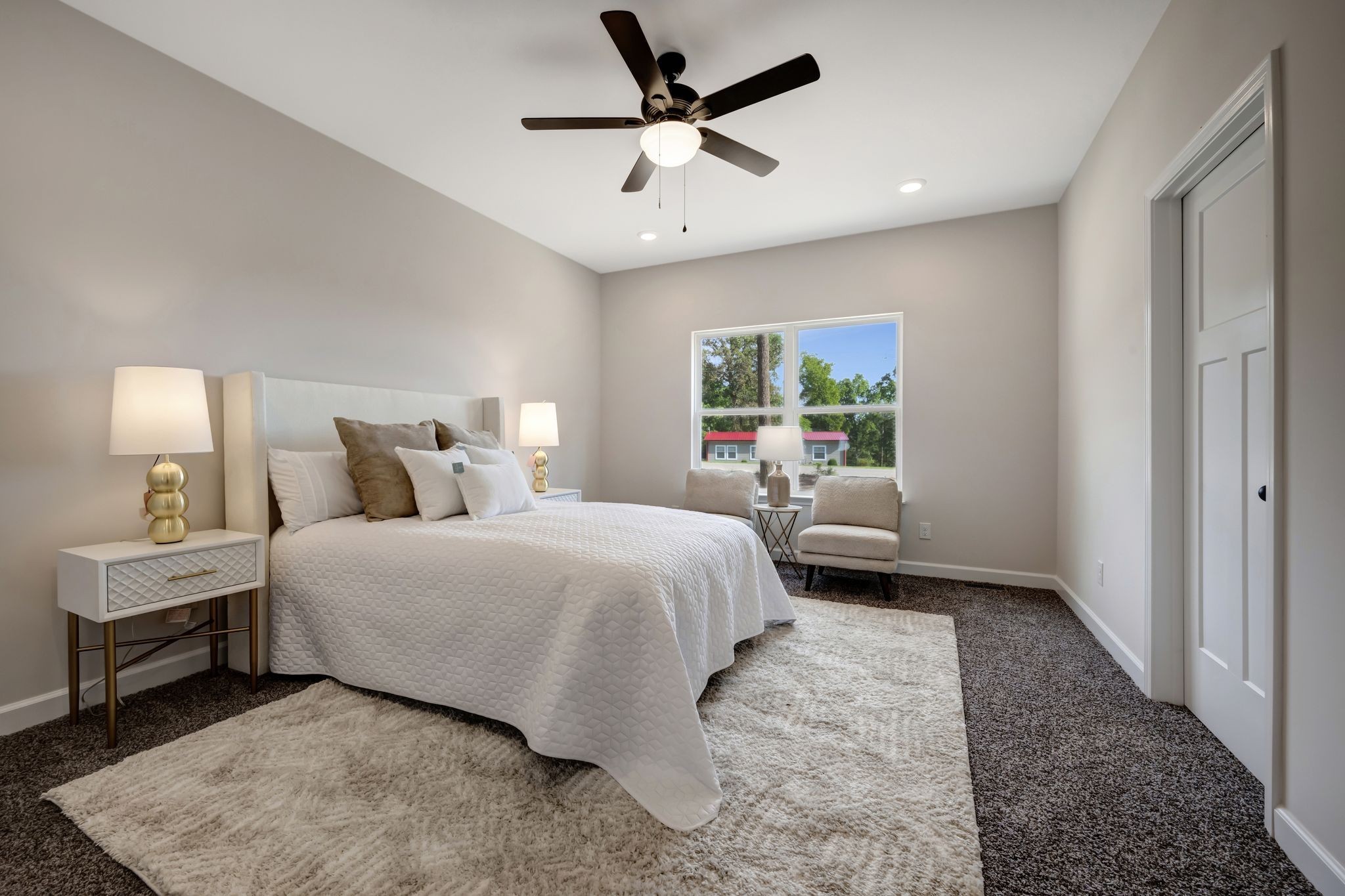 1514 East Piney Road Dickson, TN 37055 - Photo 14 of 29 a bedroom with a large bed and a chandelier