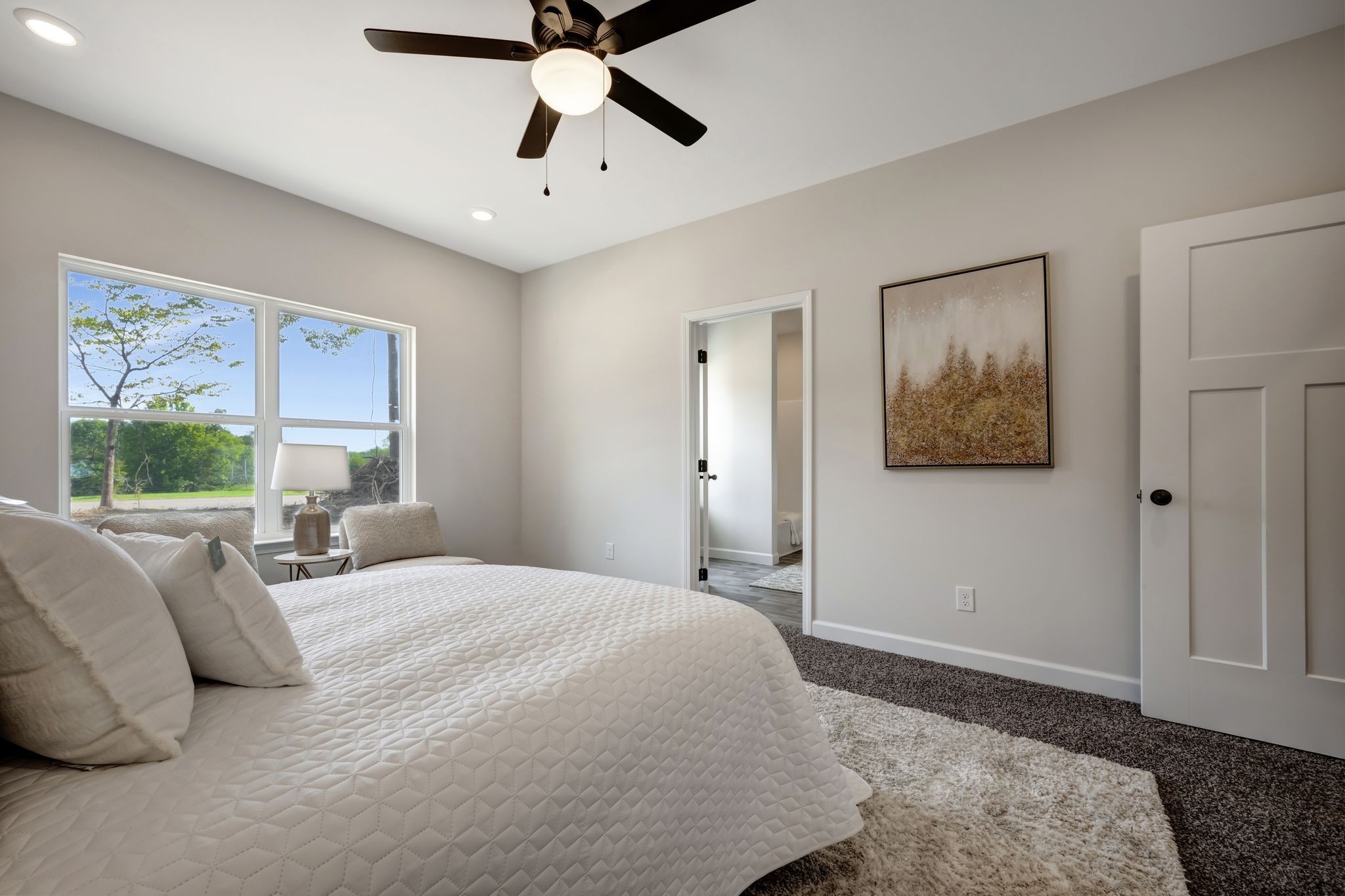 1514 East Piney Road Dickson, TN 37055 - Photo 15 of 29 a bedroom with a large bed and a window