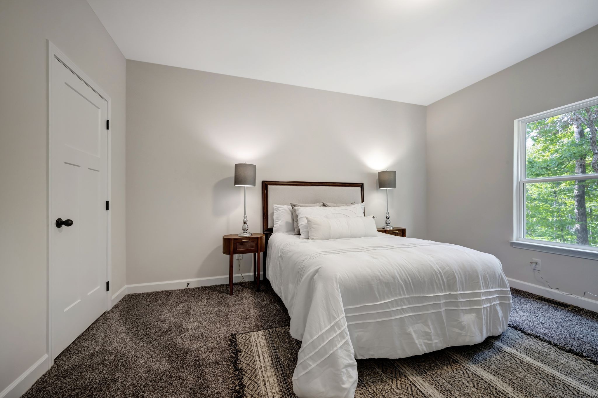 1514 East Piney Road Dickson, TN 37055 - Photo 16 of 29 a bedroom with a bed and wooden floor