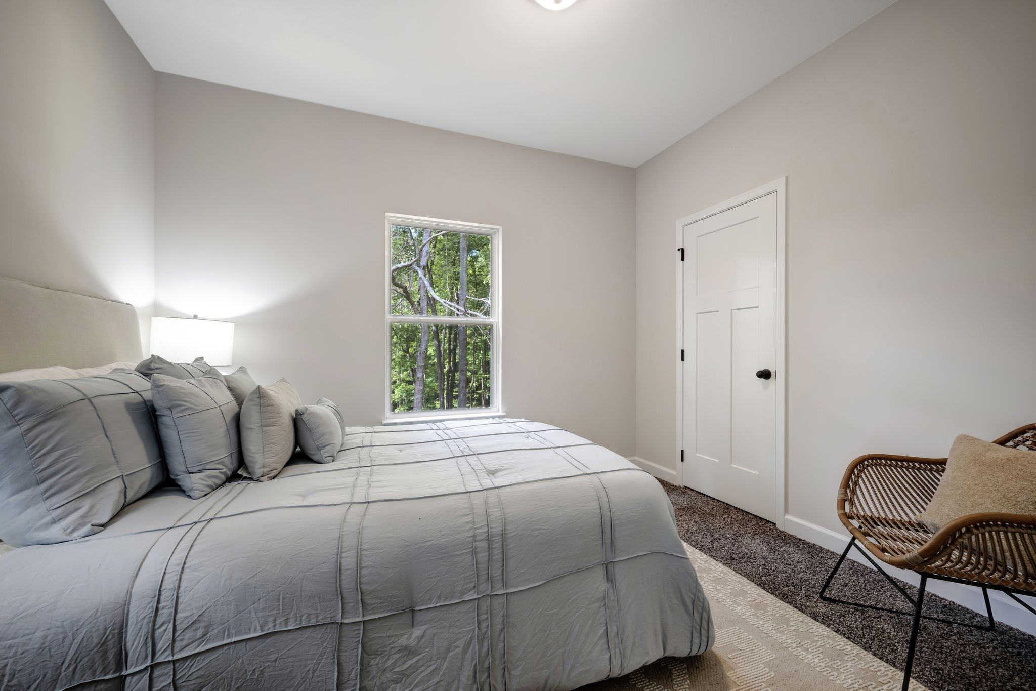 1514 East Piney Road Dickson, TN 37055 - Photo 19 of 29 a bedroom with a bed and chair