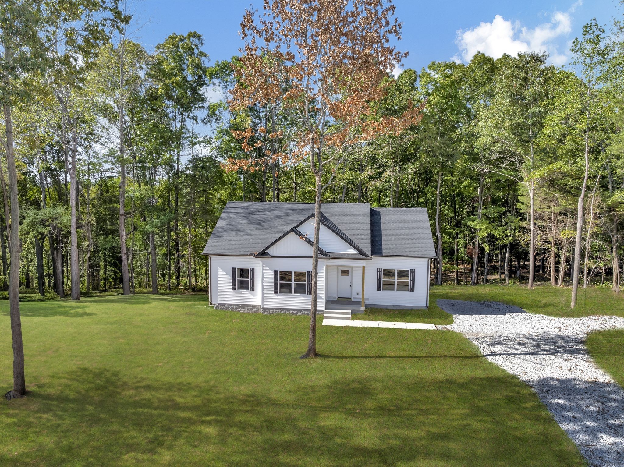 1514 East Piney Road Dickson, TN 37055 - Photo 22 of 29 a view of a house with a big yard