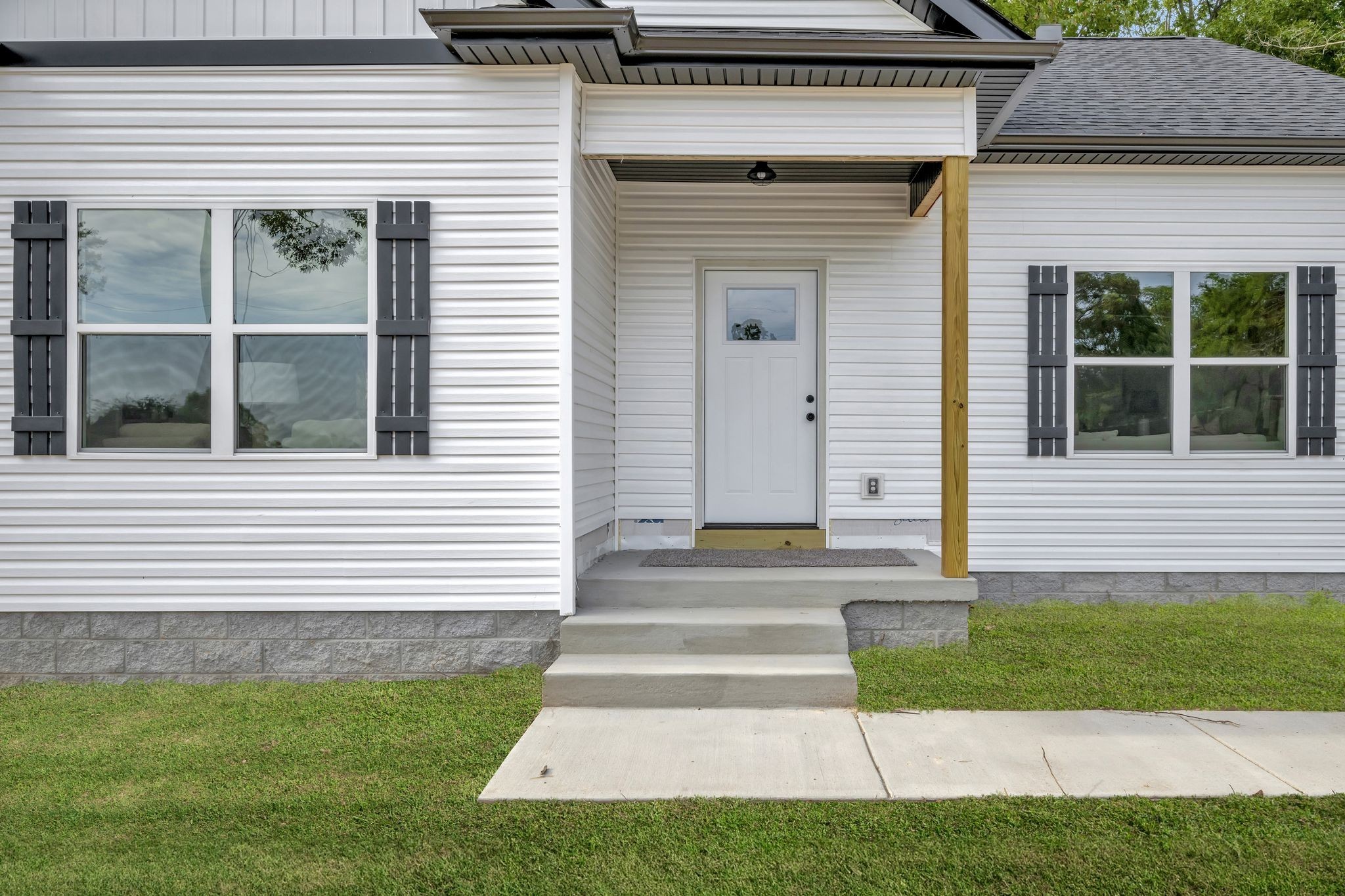 1514 East Piney Road Dickson, TN 37055 - Photo 23 of 29 a front view of a house with a yard