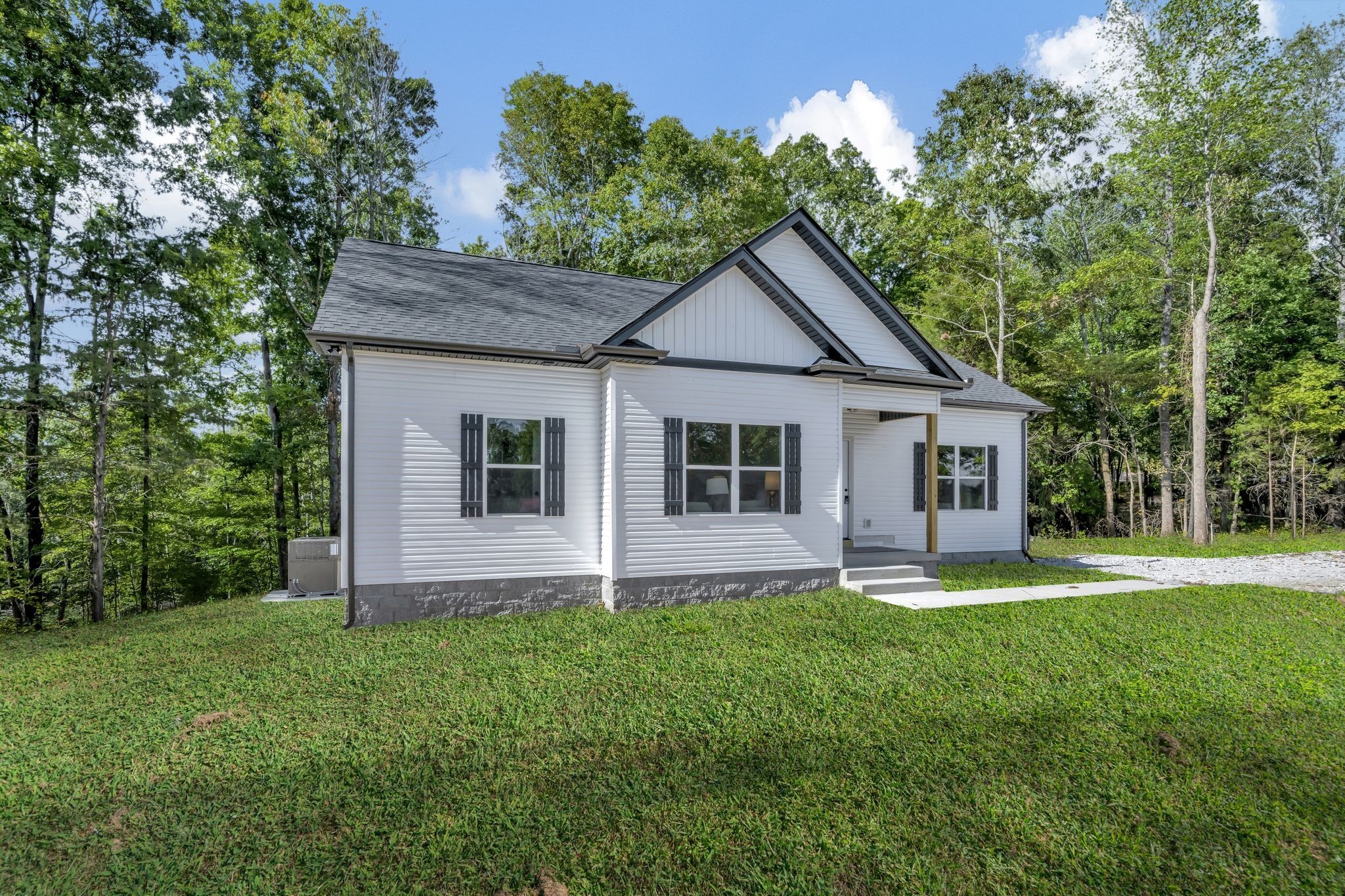 1514 East Piney Road Dickson, TN 37055 - Photo 27 of 29 a front view of house with a garden