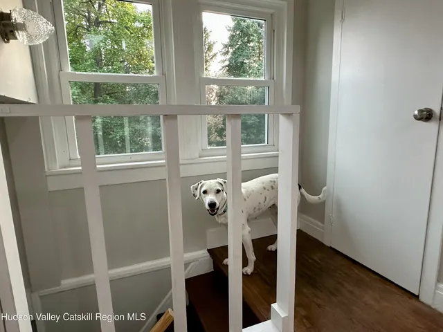 a view of balcony and dining room