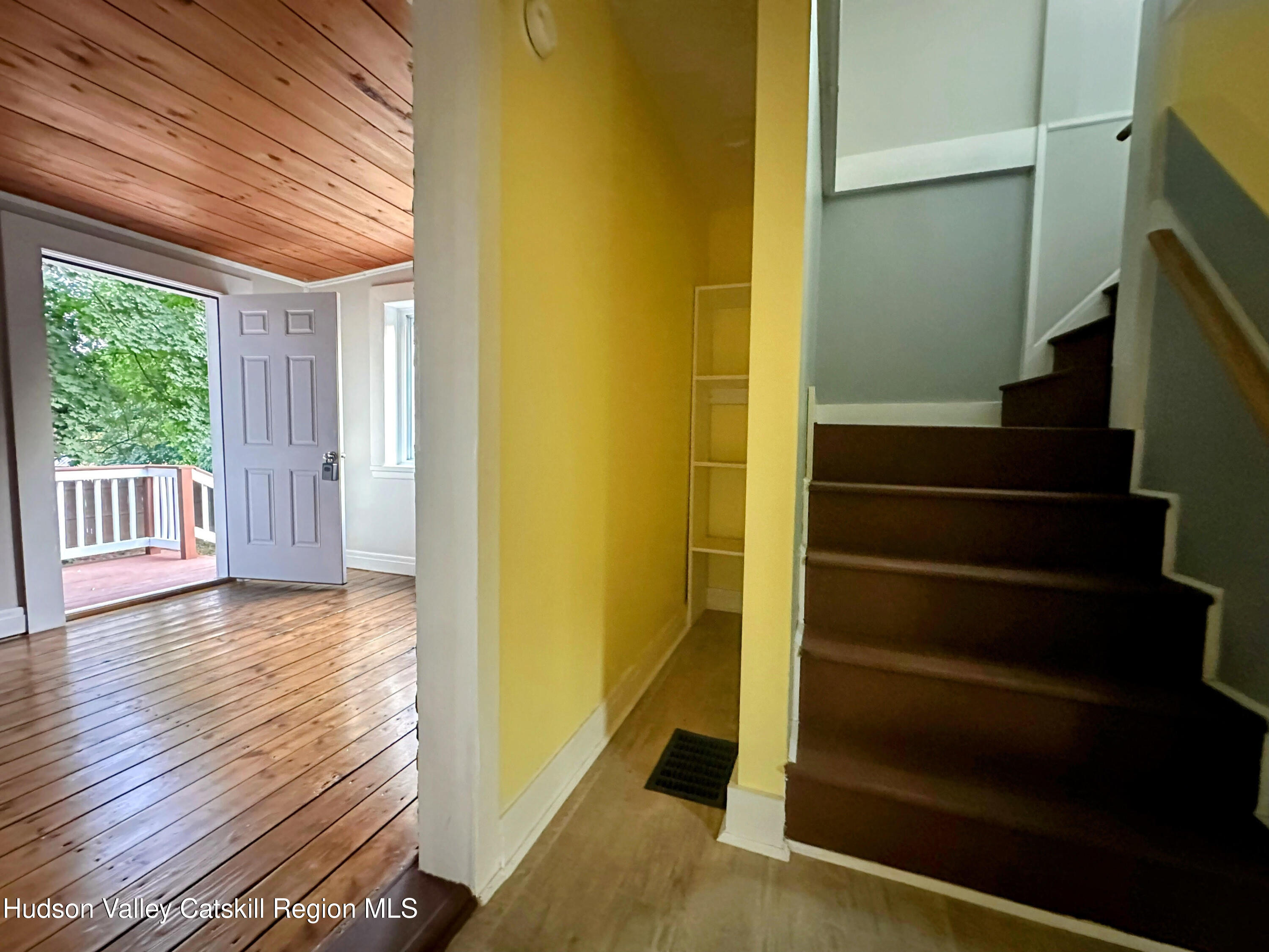 134 Lower Post Road Ghent, NY 12075 - Photo 8 of 19 a view of an entryway with wooden floor and door