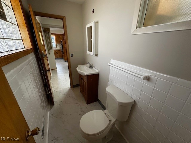 8375 Royal Ridge Drive Parma, OH 44129 - Photo 5 of 12 Bathroom with toilet and vanity