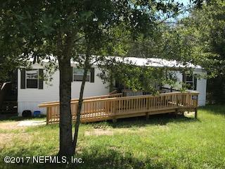 7268 Gas Line Road Keystone Heights, FL 32656 - Photo 1 of 12 a view of a patio with a yard