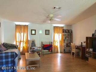 7268 Gas Line Road Keystone Heights, FL 32656 - Photo 3 of 12 a view of a livingroom with furniture window and wooden floor