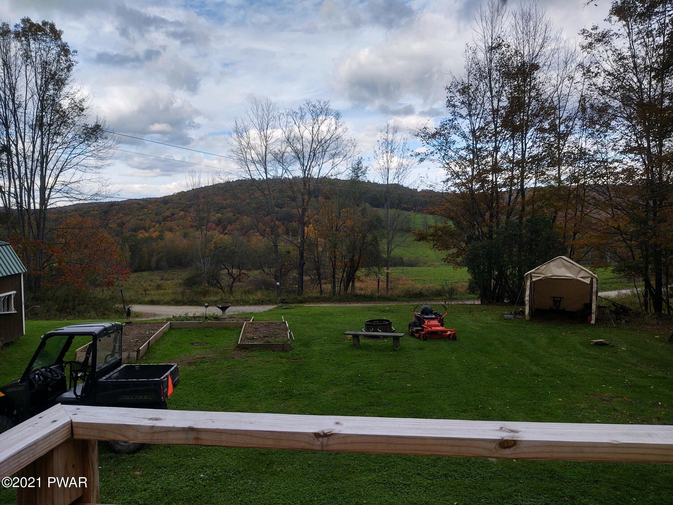 279 Mountain Road Susquehanna, PA 18847 - Photo 5 of 25 looking off of the new deck into the hil