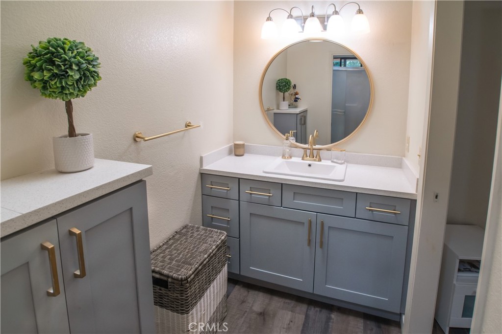 1 San Ramon Drive Chico, CA 95973 - Photo 27 of 42 a bathroom with a sink and a mirror
