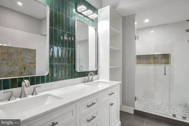 a spacious bathroom with a bathtub sink and toilet