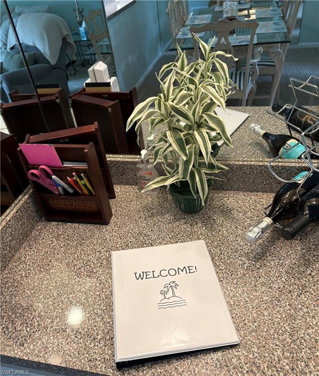 5841 Rattlesnake Hammock Road, Unit I203 Naples, FL 34113 - Photo 2 of 20 a view of car garage