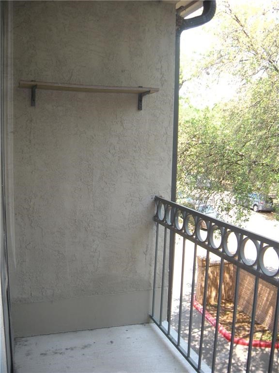 1910 Robbins Place, Unit 210 Austin, TX 78705 - Photo 13 of 13 a view of an empty room with a window