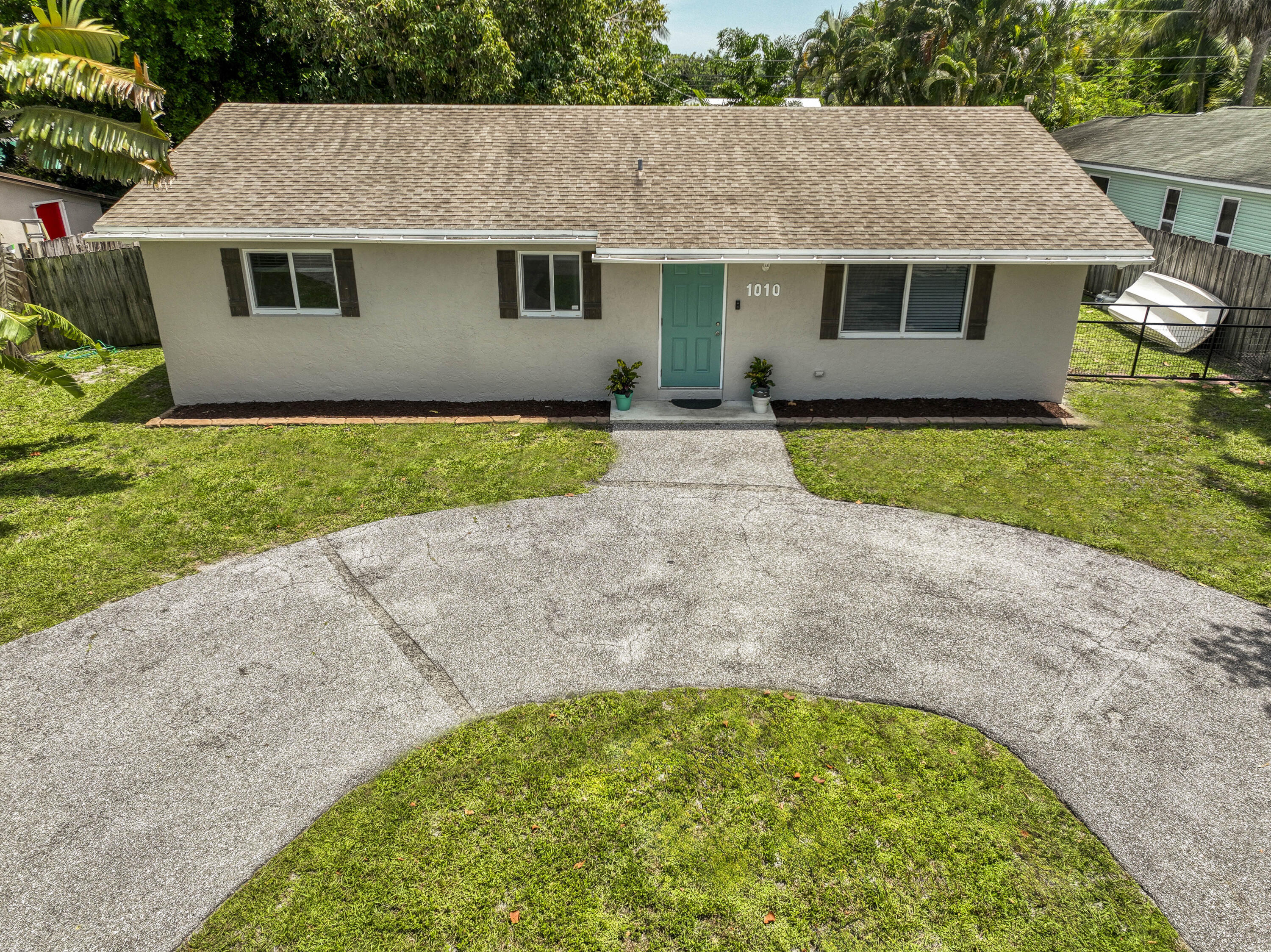 1010 Comanche Street Jupiter, FL 33458 - Photo 2 of 26 DJI_0619