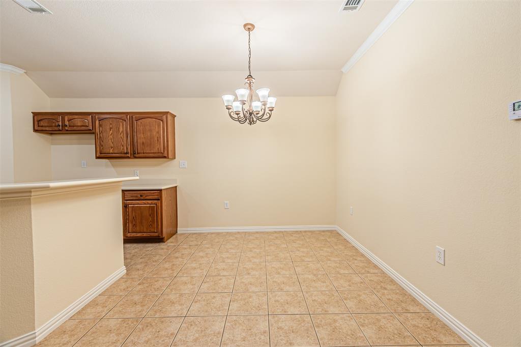 105 Sunglow Loop Red Oak, TX 75154 - Photo 14 of 40 a view of a hallway with front door and wooden floor