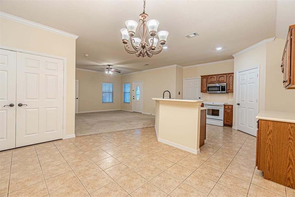 105 Sunglow Loop Red Oak, TX 75154 - Photo 15 of 40 a view of a kitchen with a sink
