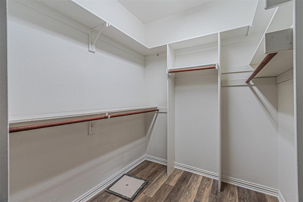 105 Sunglow Loop Red Oak, TX 75154 - Photo 25 of 40 a view of walk in closet with empty racks