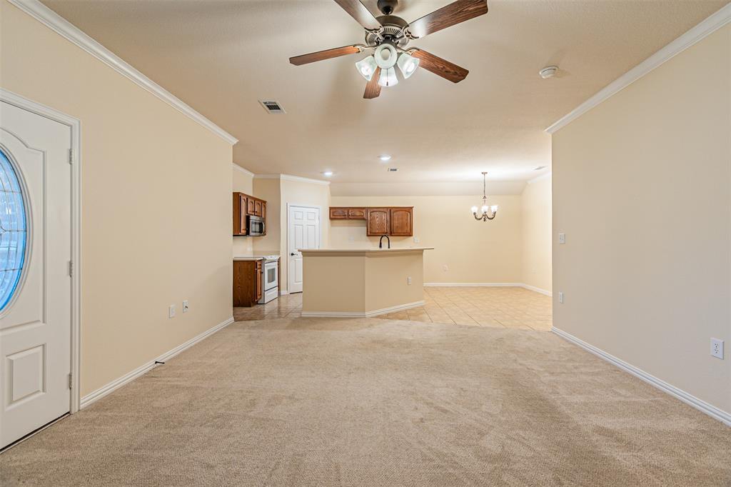 105 Sunglow Loop Red Oak, TX 75154 - Photo 6 of 40 a view of a kitchen with a sink and cabinet area