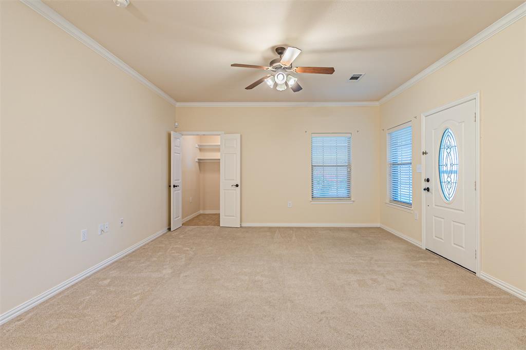 105 Sunglow Loop Red Oak, TX 75154 - Photo 7 of 40 a view of an empty room with a window