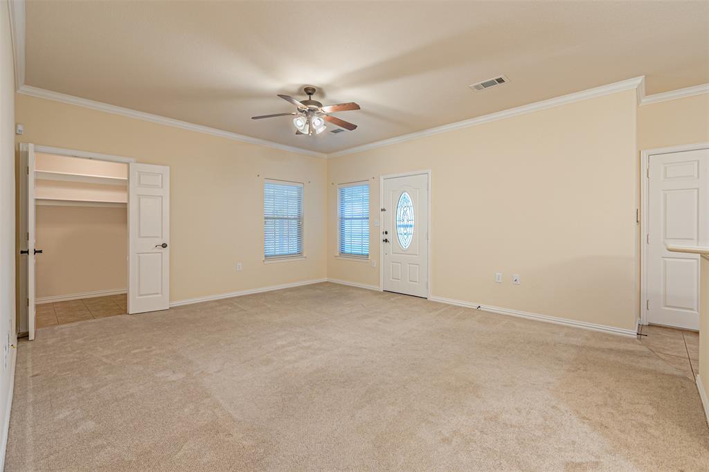 105 Sunglow Loop Red Oak, TX 75154 - Photo 8 of 40 a view of an empty room with a window