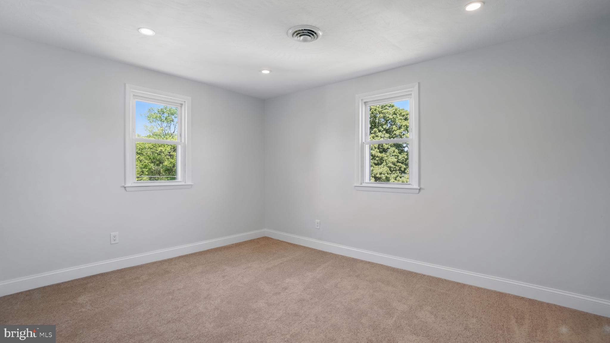 8014 Ritchie Highway Pasadena, MD 21122 - Photo 28 of 38 an empty room with windows