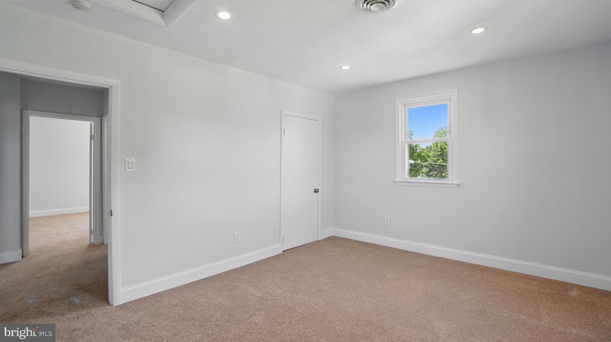 8014 Ritchie Highway Pasadena, MD 21122 - Photo 29 of 38 an empty room with a window