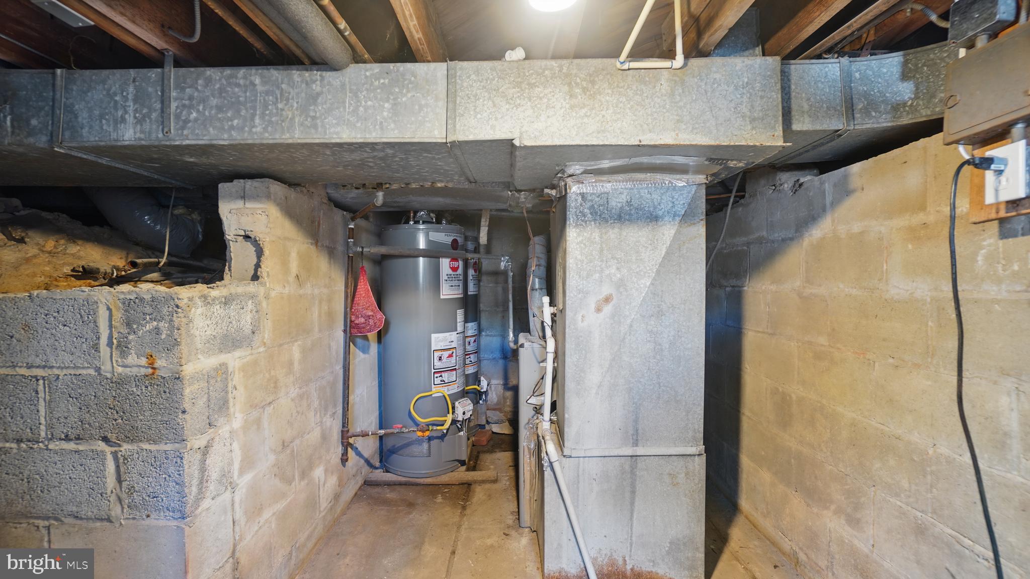 8014 Ritchie Highway Pasadena, MD 21122 - Photo 35 of 38 a close view of water heater room