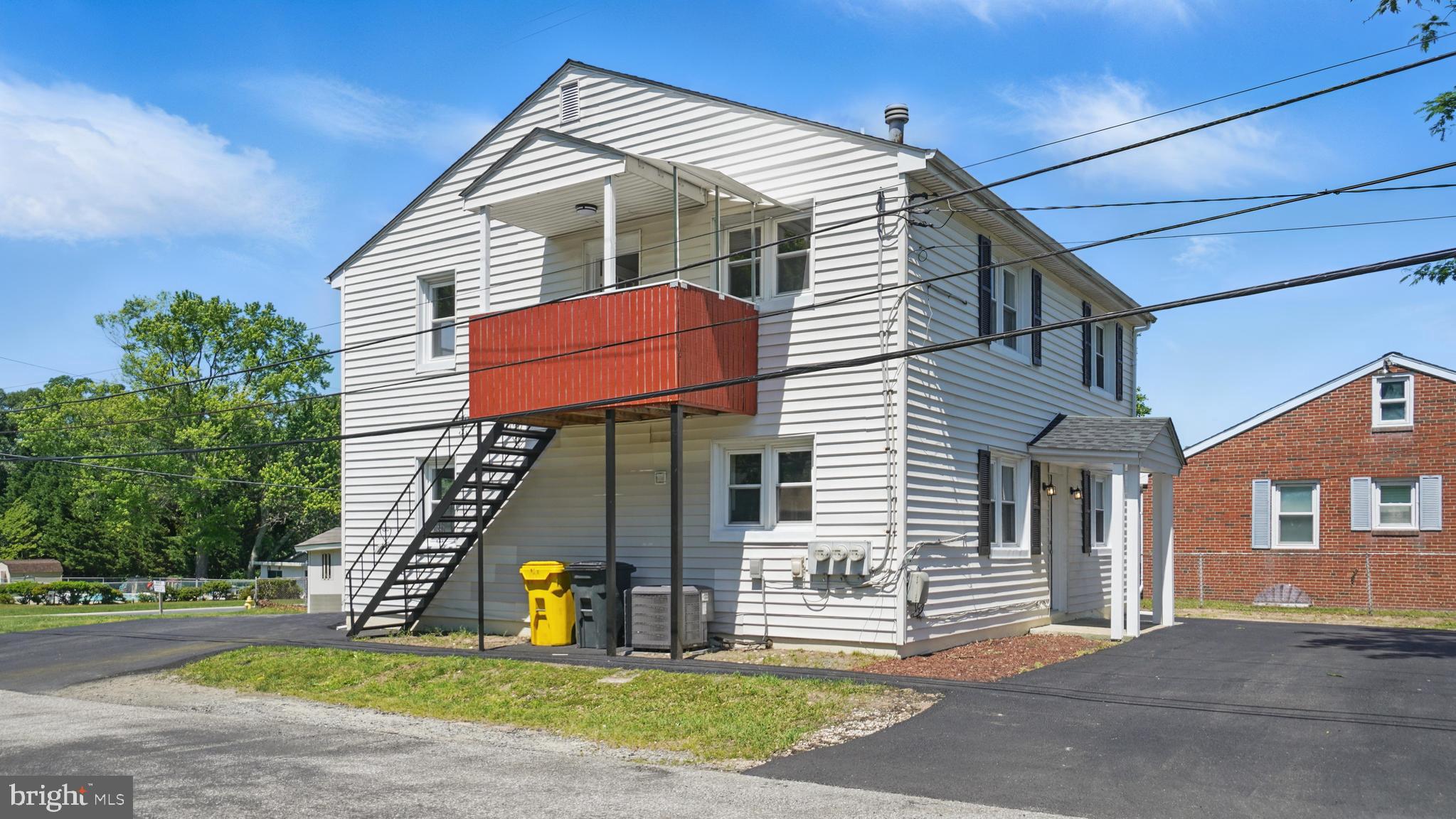8014 Ritchie Highway Pasadena, MD 21122 - Photo 4 of 38 a front view of building with garage