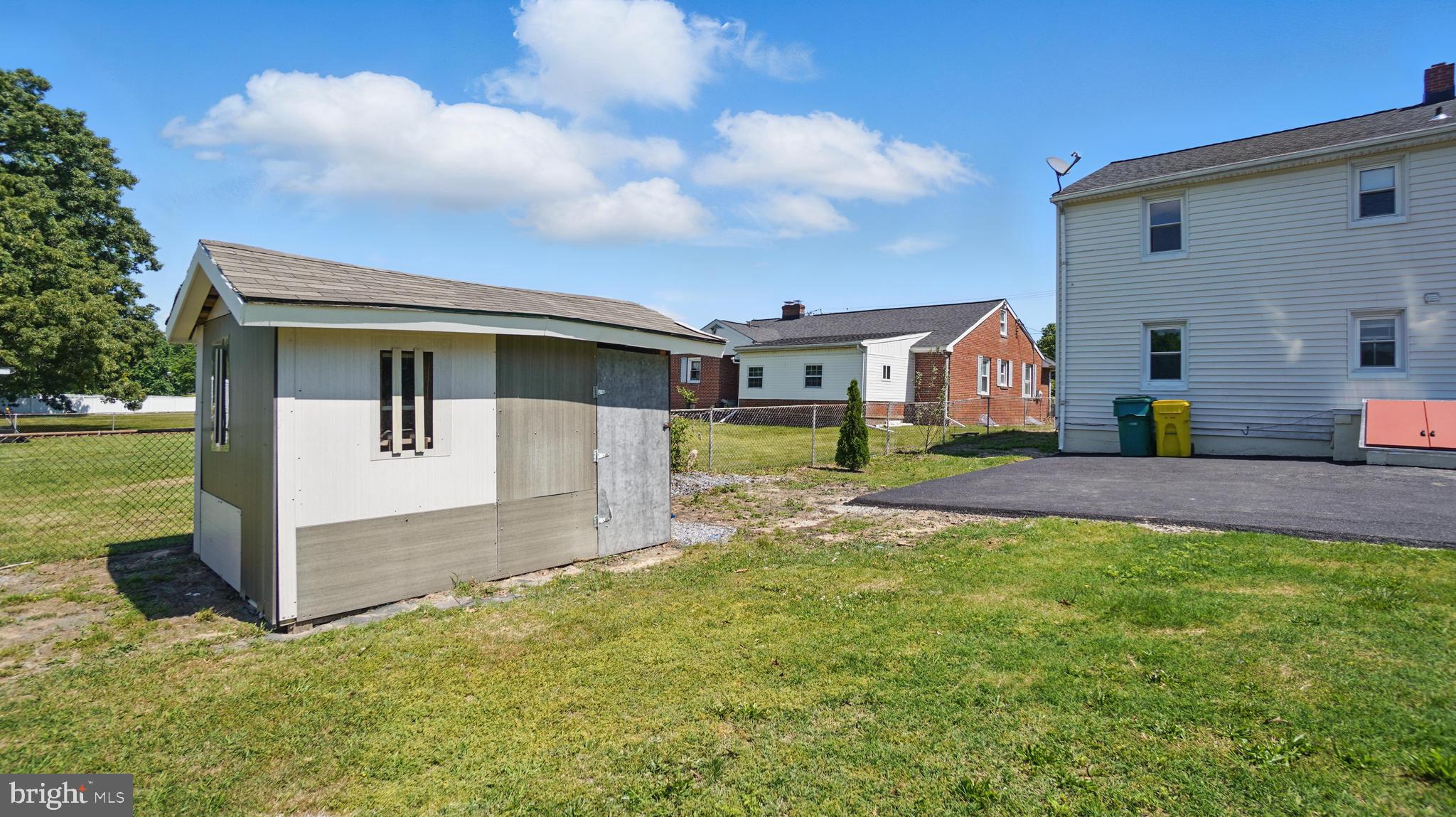8014 Ritchie Highway Pasadena, MD 21122 - Photo 6 of 38 a front view of house with yard