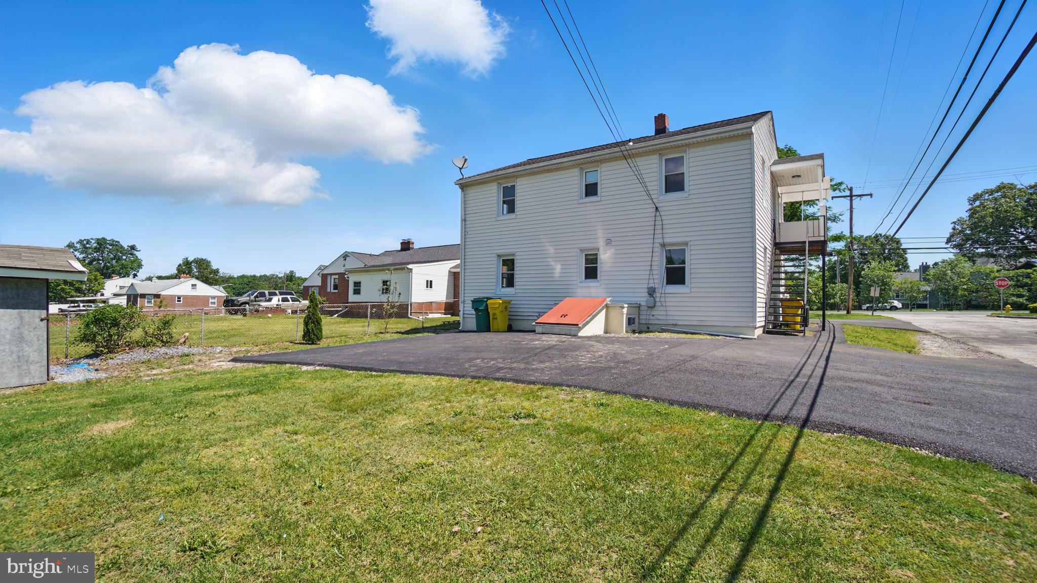 8014 Ritchie Highway Pasadena, MD 21122 - Photo 8 of 38 a view of a backyard with sitting area