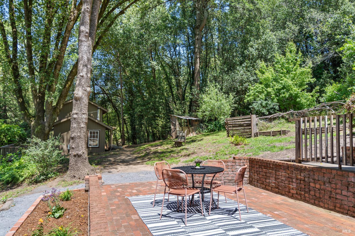 805 Wagnon Road Sebastopol, CA 95472 - Photo 41 of 56 a view of backyard with seating space and trees