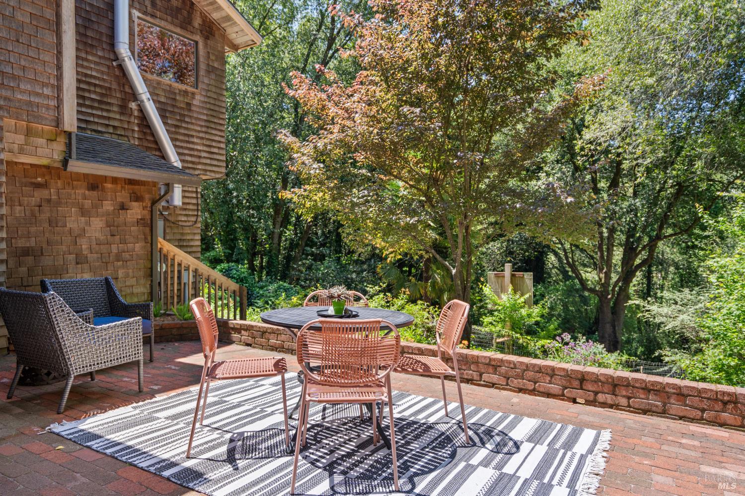 805 Wagnon Road Sebastopol, CA 95472 - Photo 42 of 56 a view of a patio with a table and chairs and couches
