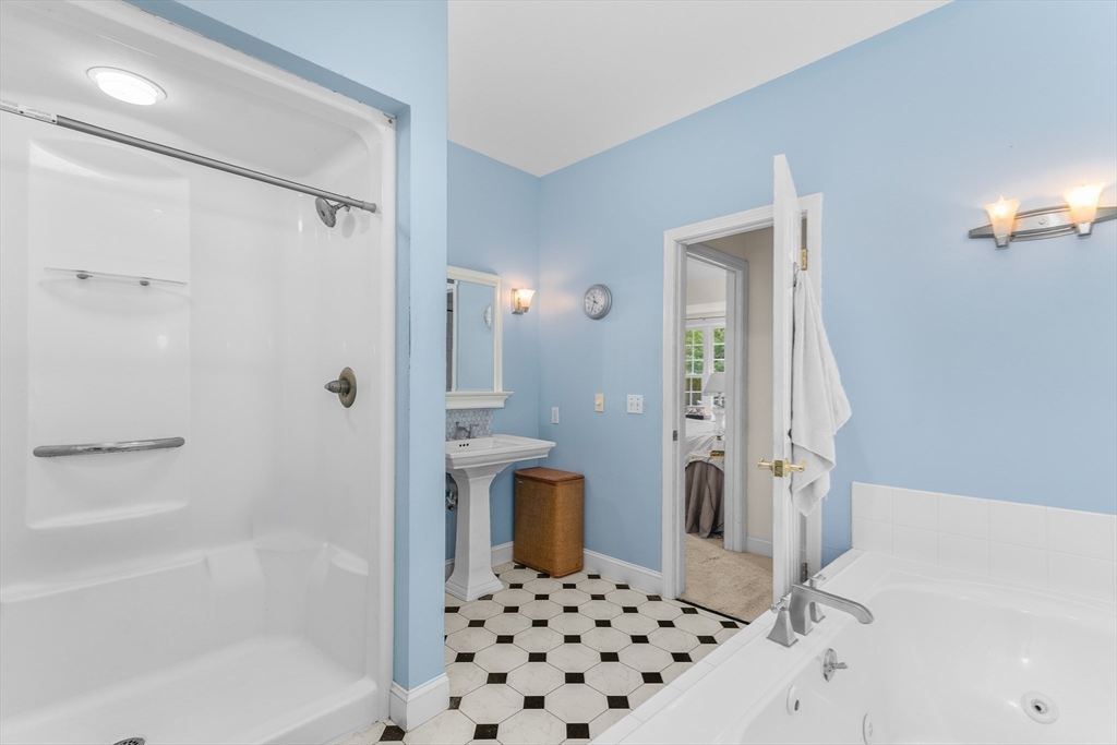 113 Greenwich Plains Road Ware, MA 01082 - Photo 21 of 42 a bathroom with a bathtub and a shower