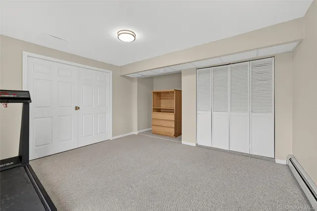 a view of a room with a large window