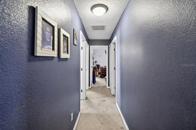 a view of a hallway with a hallway
