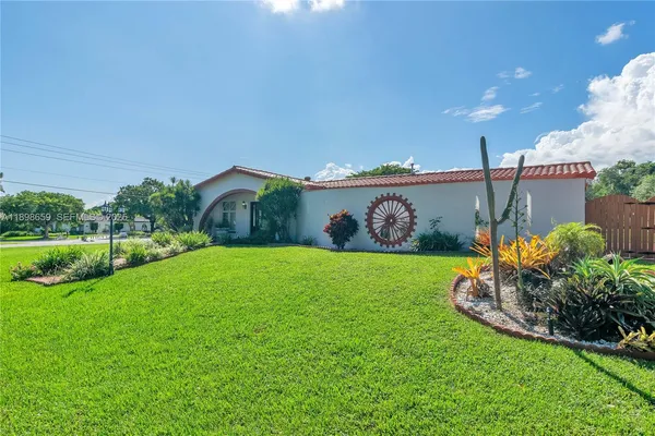 a house view with a garden space