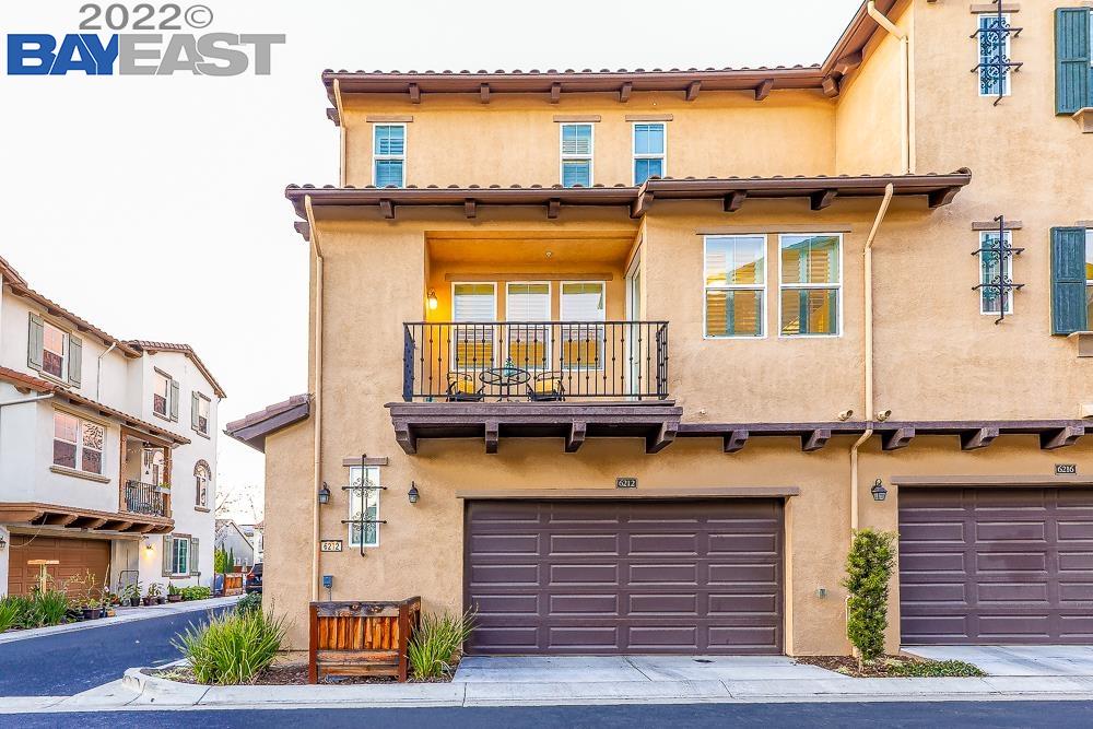a view of a building with a street