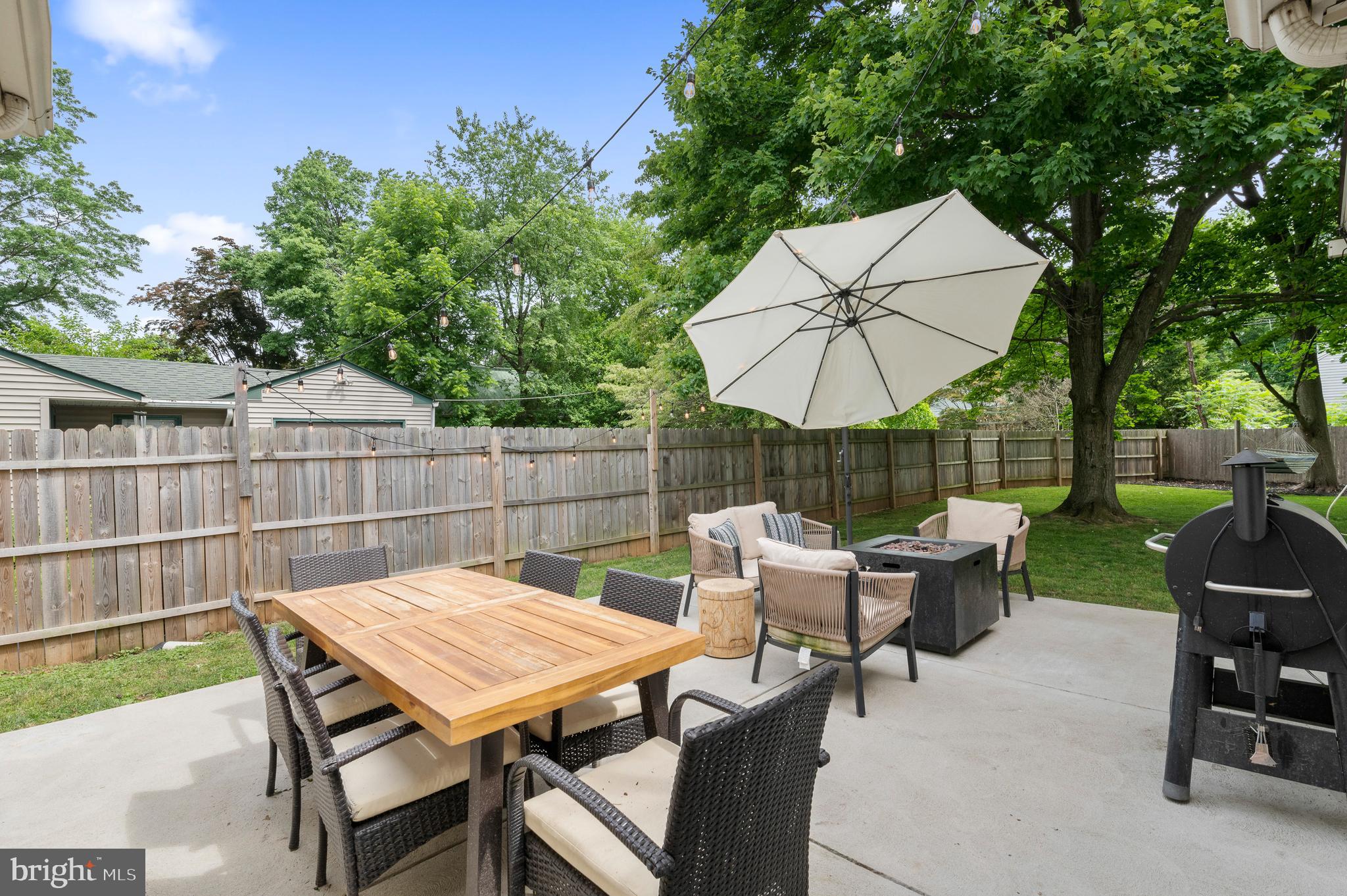 105 Manor Road Paoli, PA 19301 - Photo 24 of 30 a view of a patio with a table and chairs