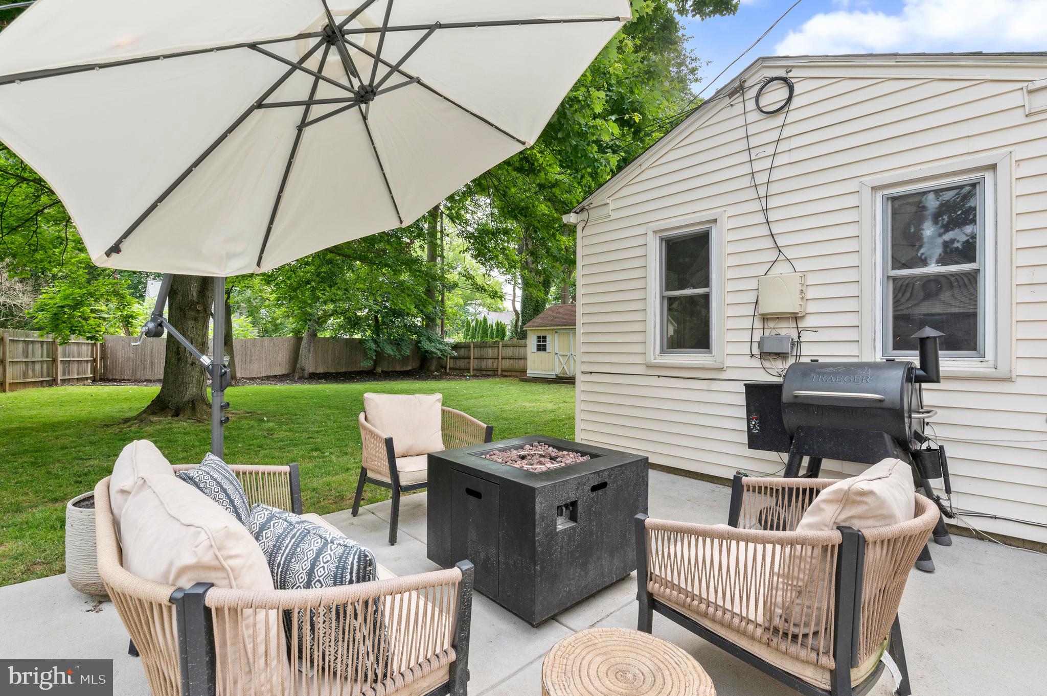105 Manor Road Paoli, PA 19301 - Photo 25 of 30 a view of a patio with a table and chairs