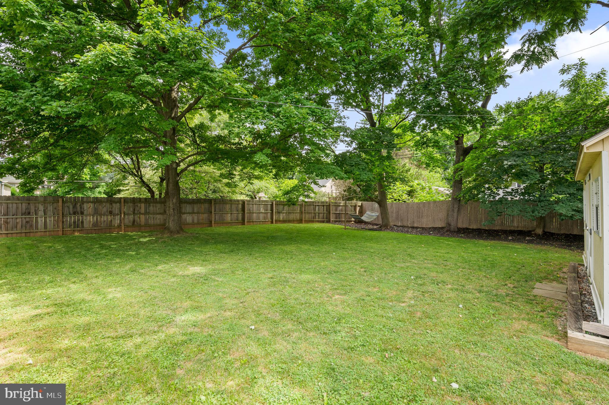 105 Manor Road Paoli, PA 19301 - Photo 29 of 30 a view of a garden with a trees