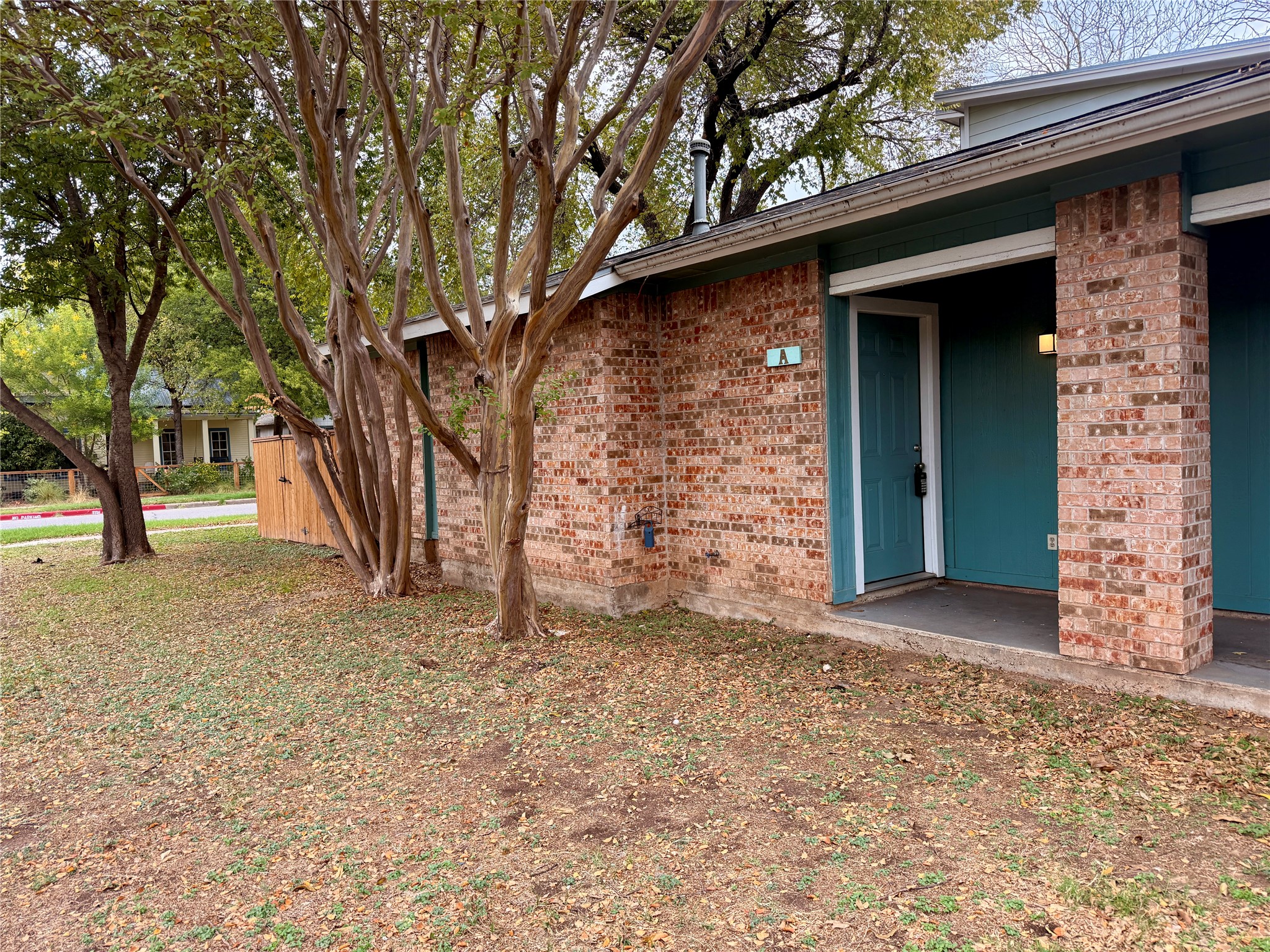 115 Waller Street, Unit A Austin, TX 78702 - Photo 1 of 1 a front view of a house with a tree