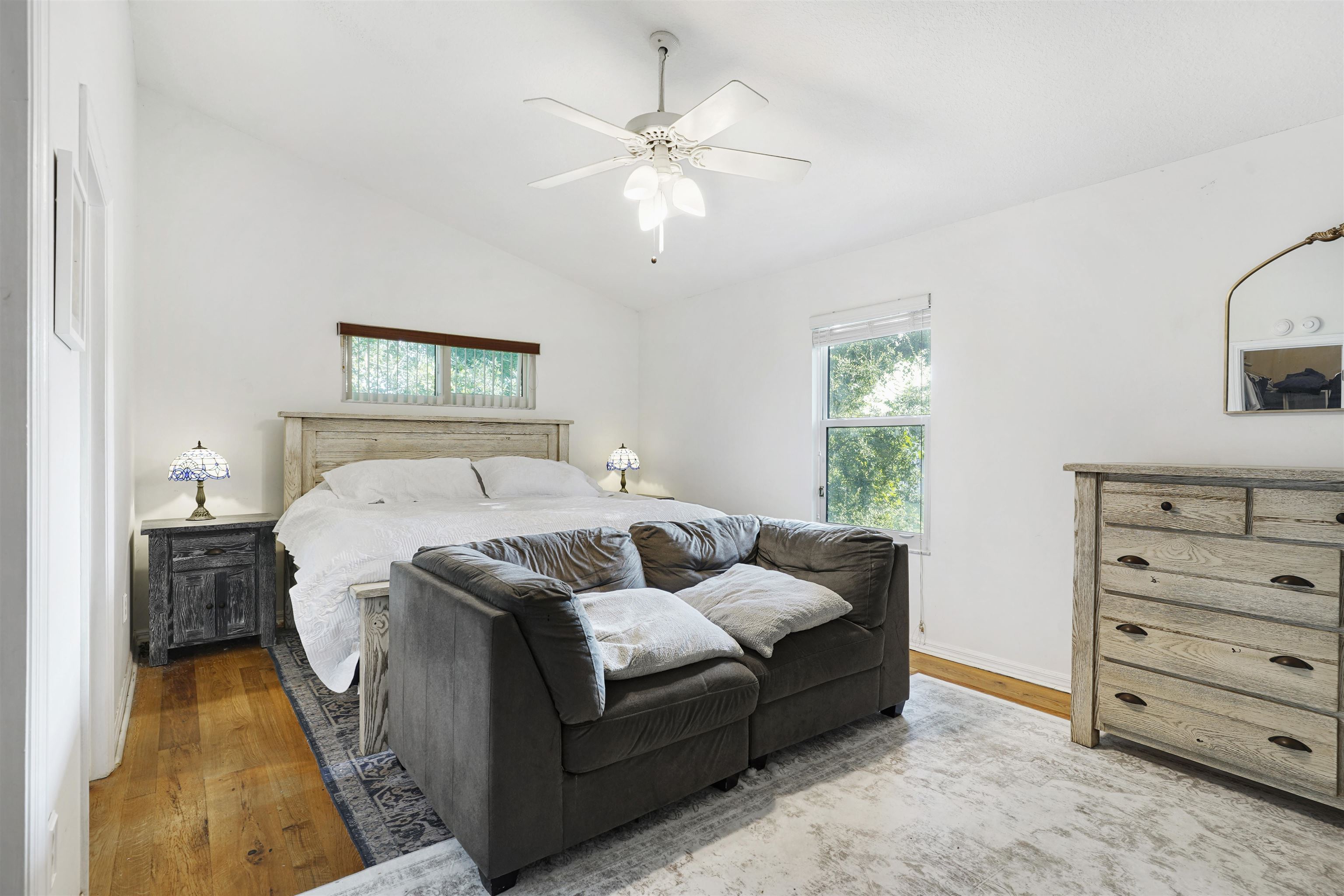 415 Fifteenth Street St. Augustine, FL 32084 - Photo 15 of 41 a bedroom with a bed and ceiling fan