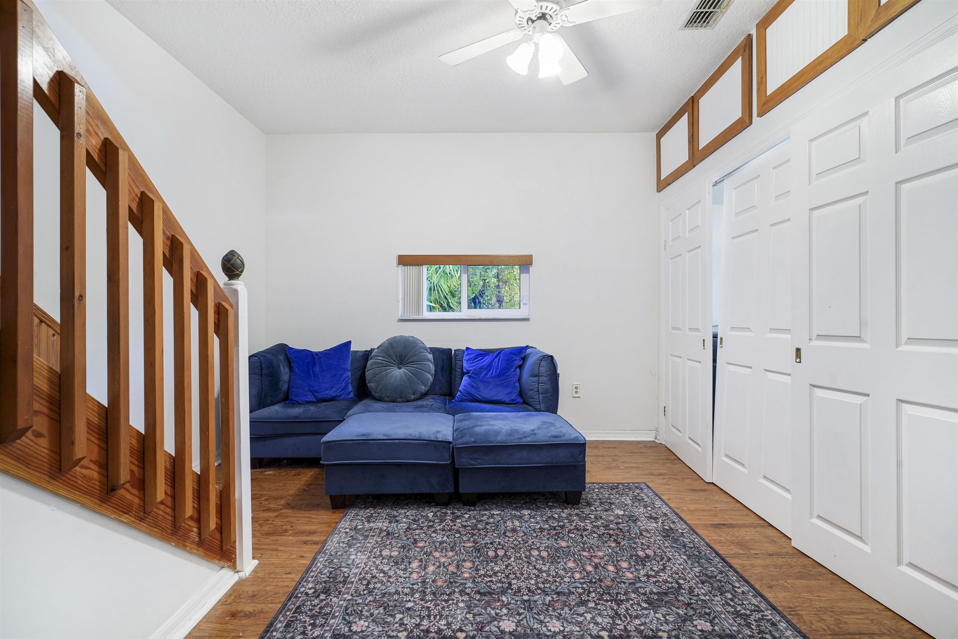 415 Fifteenth Street St. Augustine, FL 32084 - Photo 34 of 41 a living room with furniture and a rug