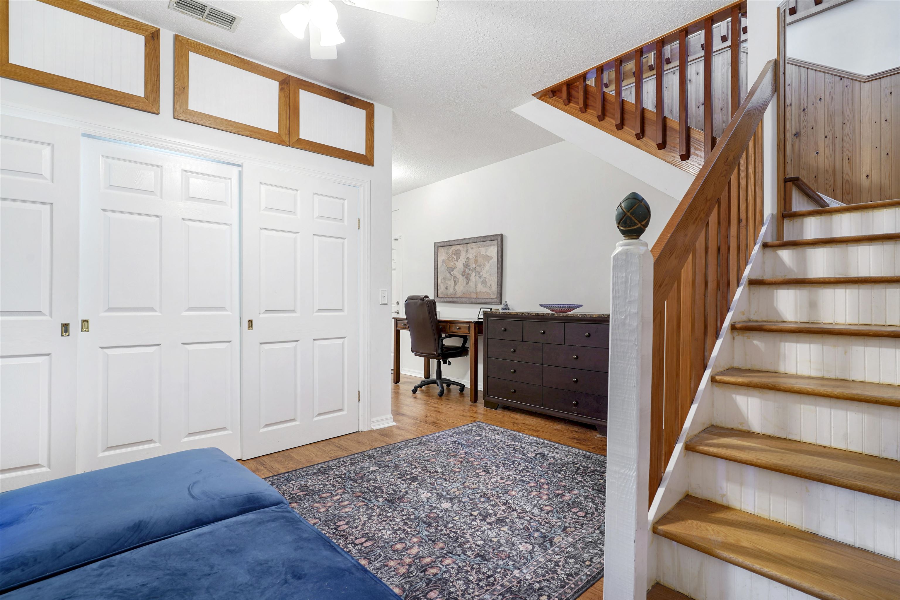 415 Fifteenth Street St. Augustine, FL 32084 - Photo 35 of 41 a view of a hallway with wooden floor and staircase