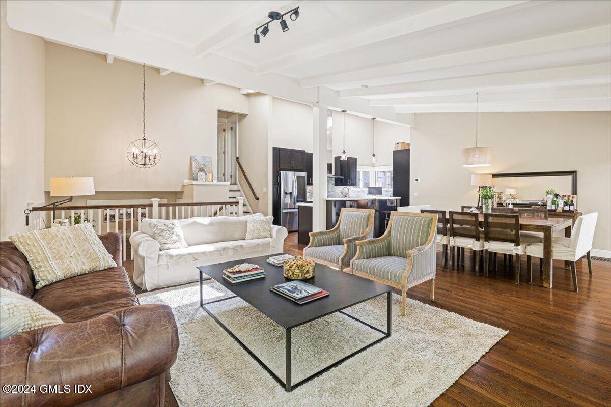 70 Gregory Road Cos Cob, CT 06807 - Photo 4 of 39 a living room with furniture kitchen view and a table