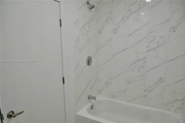 a bathroom with a bathtub