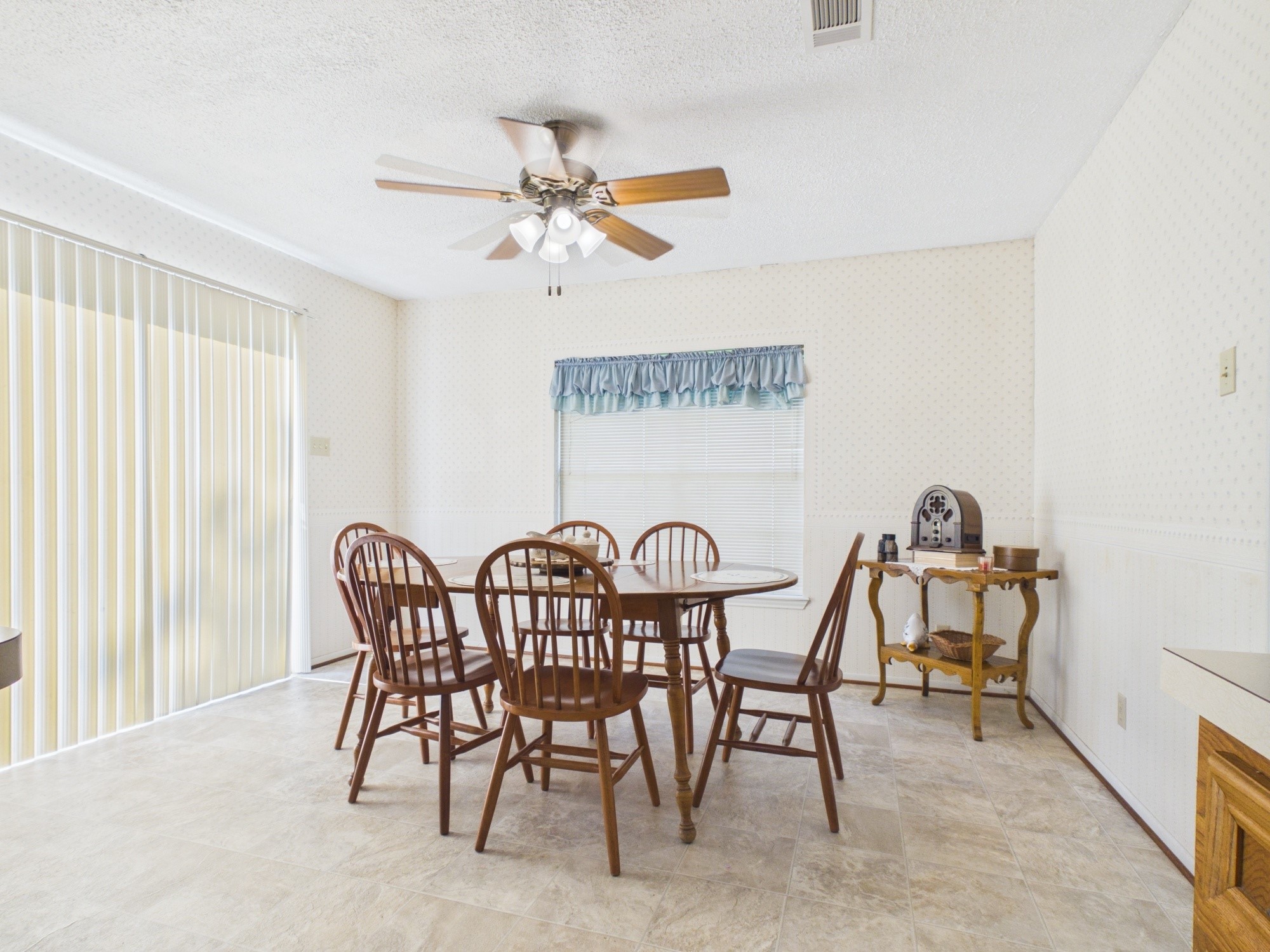 12 Harding Road Huntsville, TX 77340 - Photo 13 of 20 a view of a dining room and a table and chairs in a room